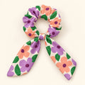 Bloom Party bow-tie scrunchie — hero view