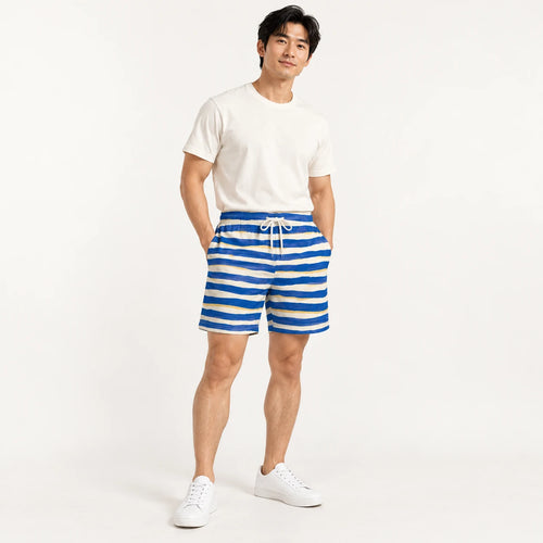 Blue Current All-Over Print Shorts — male model, hero view