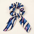 Blue Improvisation bow-tie scrunchie — hero view