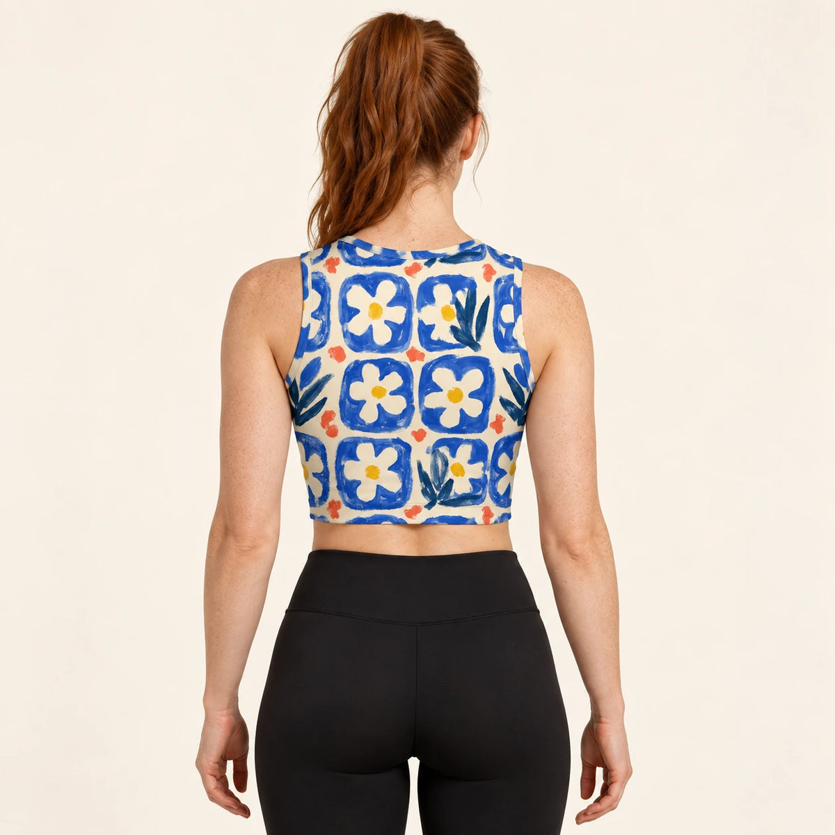 Ceramic Daisy sports crop top — female back view