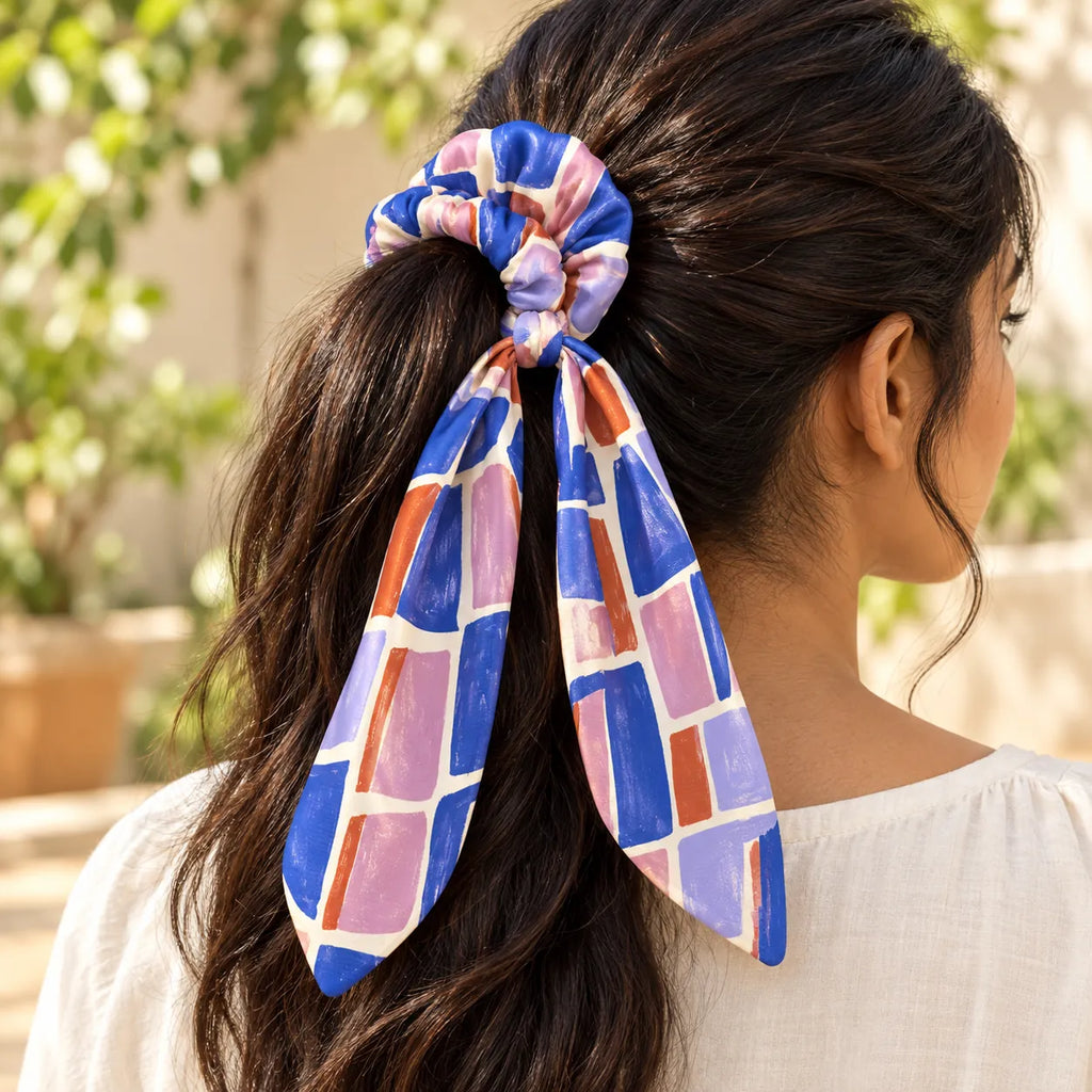 Gallery Steps bow-tie scrunchie — worn view