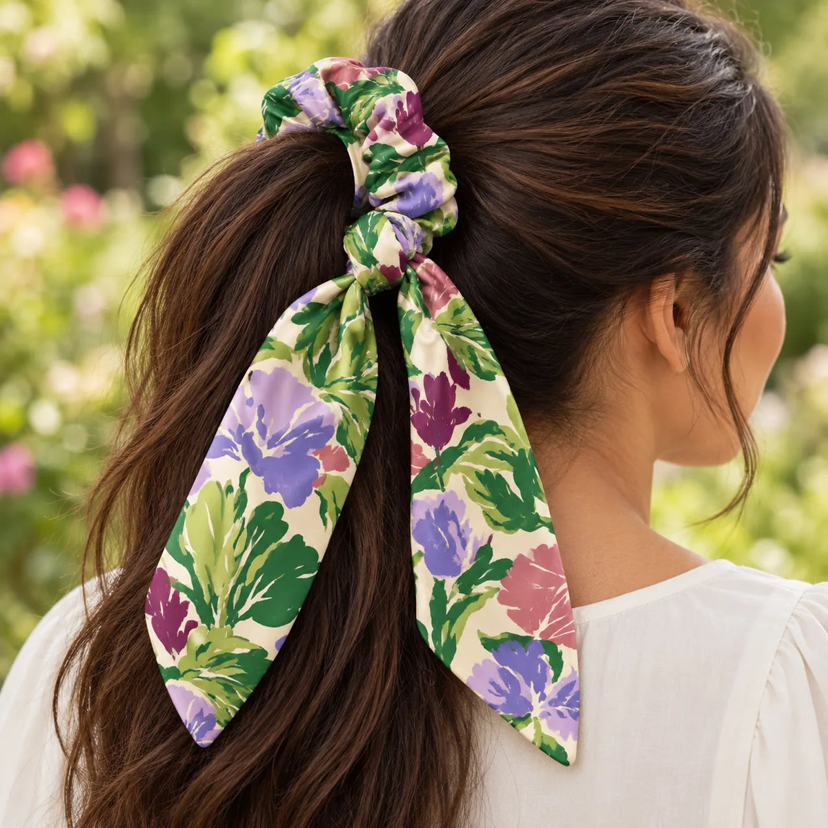 Garden Rhapsody bow-tie scrunchie — worn view
