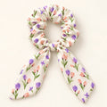 Little Buds bow-tie scrunchie — hero view