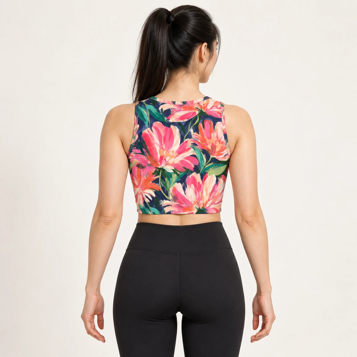 Midnight Magnolia sports crop top — female back view