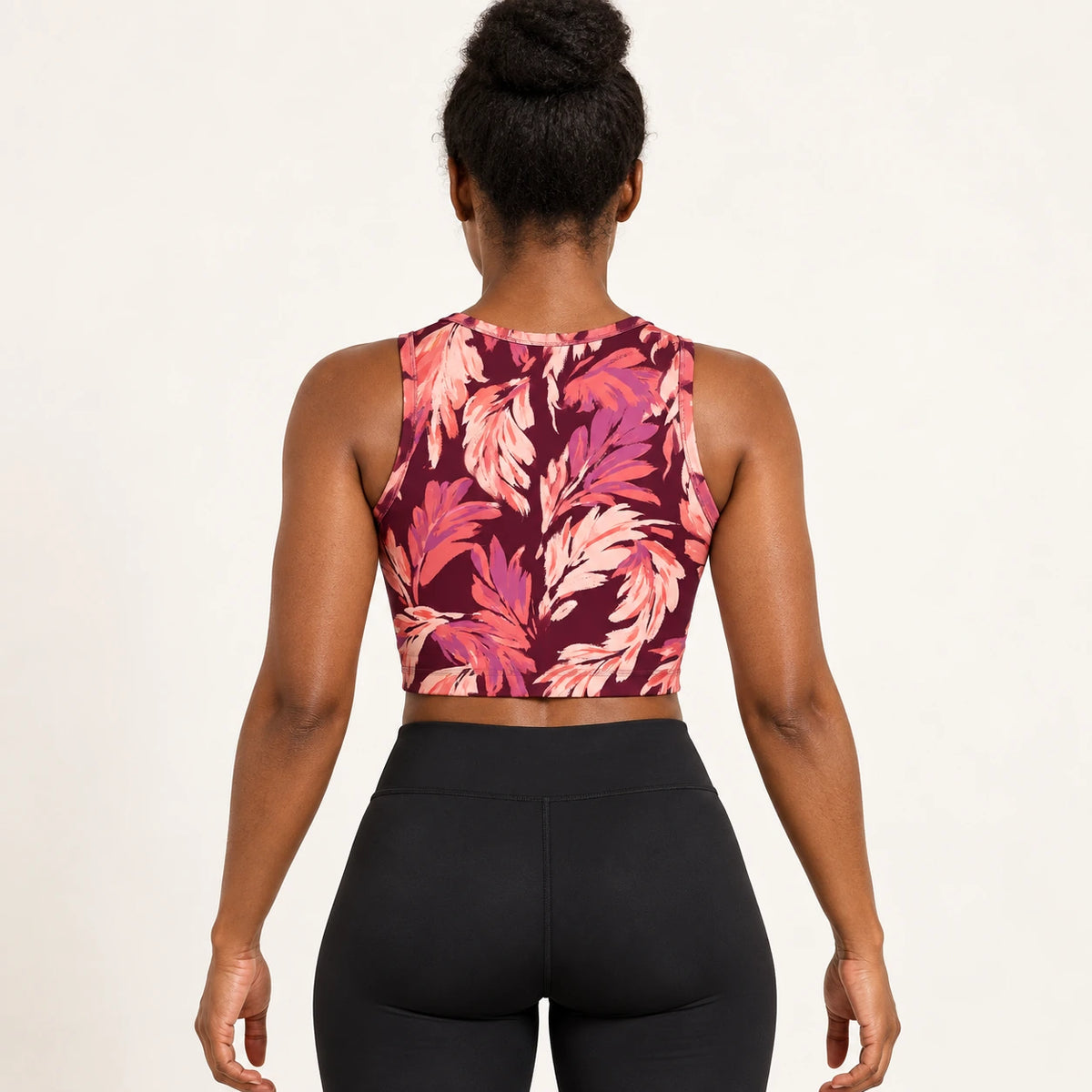 Mulberry Plumes sports crop top — female back view