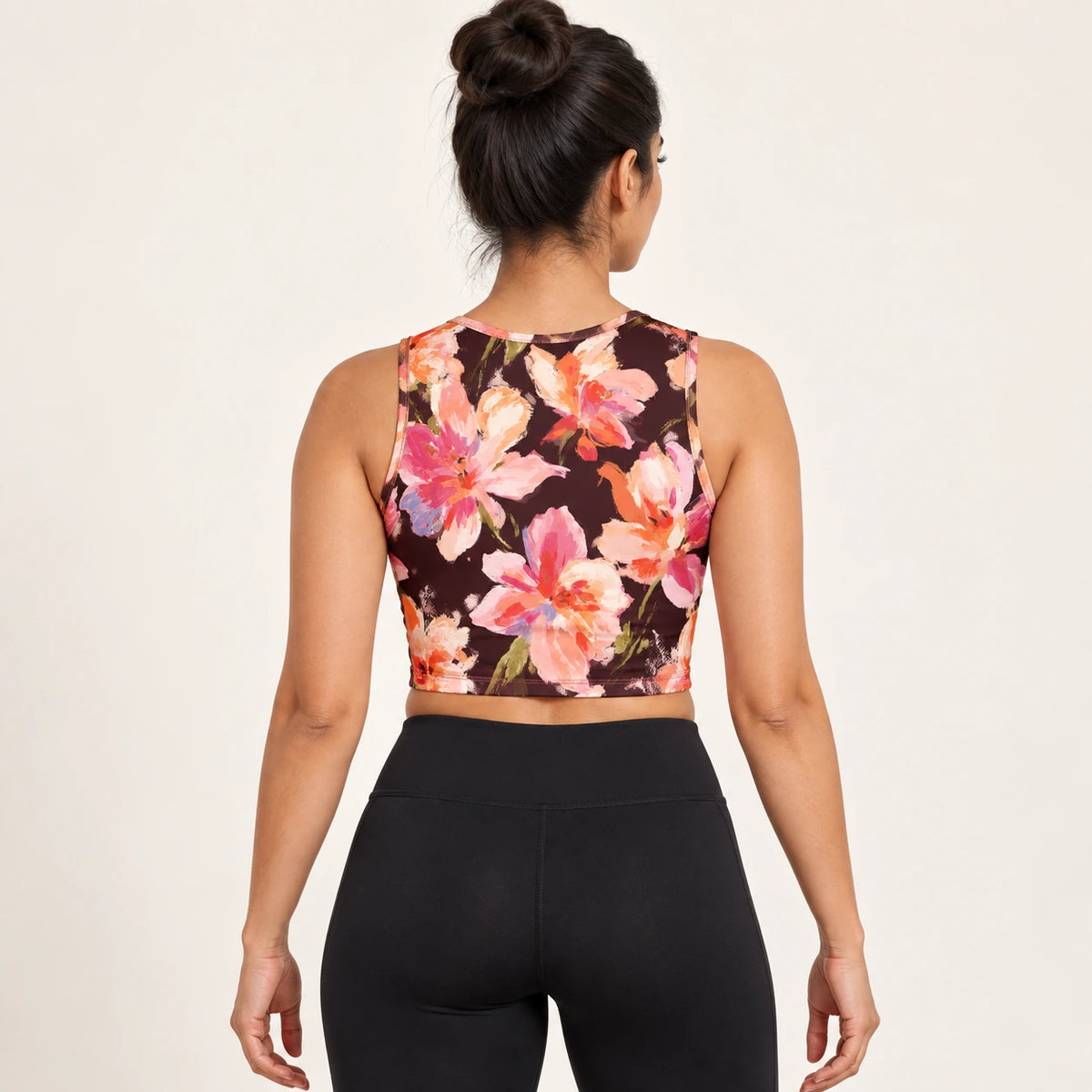 Orchid Afterglow sports crop top — female back view