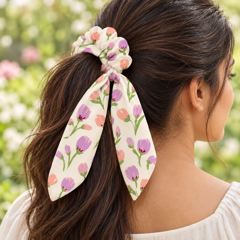 Petal Waltz bow-tie scrunchie — worn view