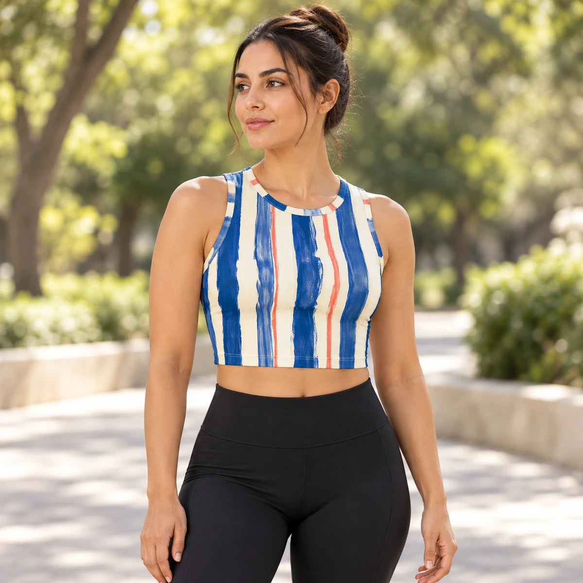 Riviera Stripe sports crop top — female lifestyle view
