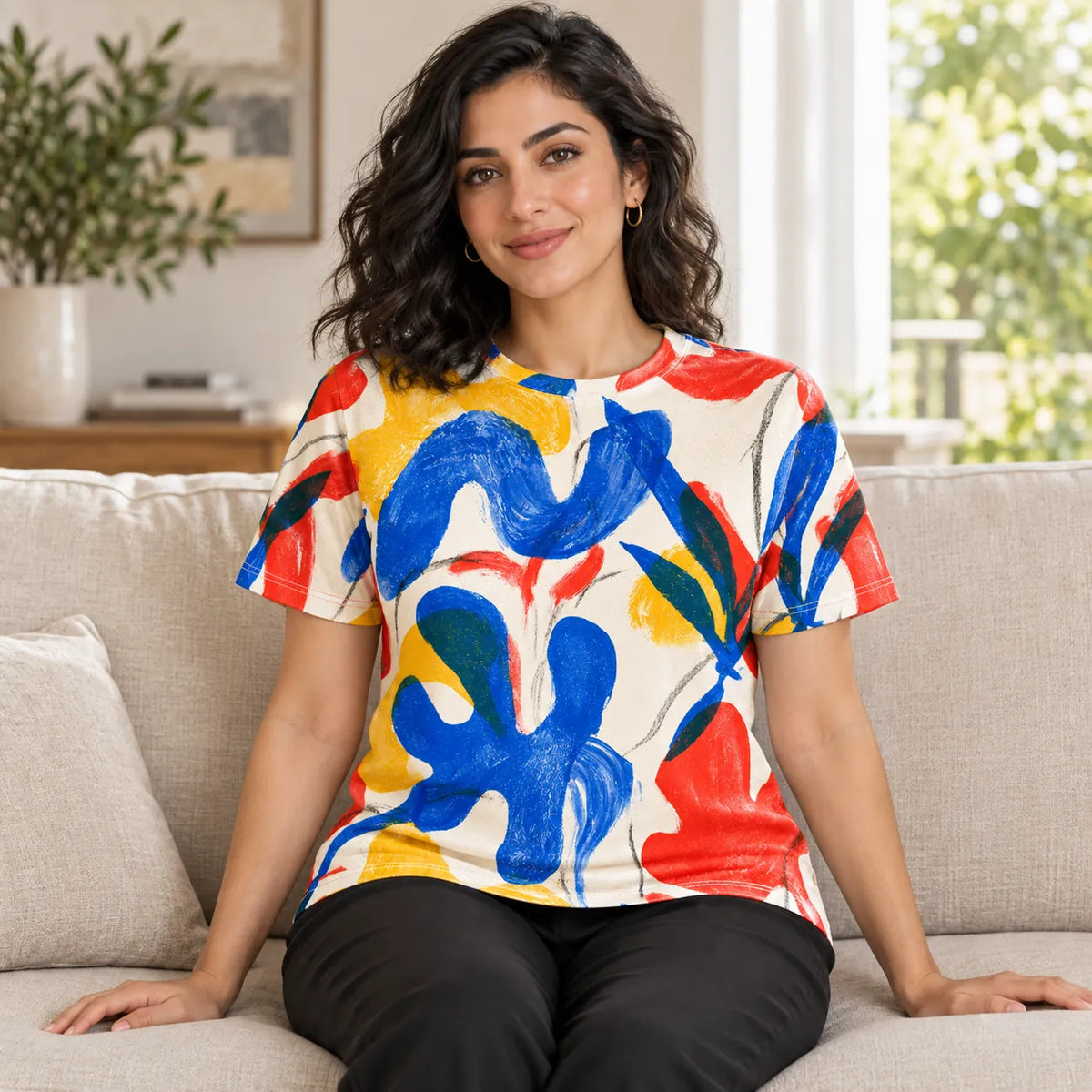 Studio Bloom All-Over Print T-Shirt — female model, sofa view